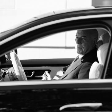 about-us-close-up-chauffeur-in-car-black-white-image